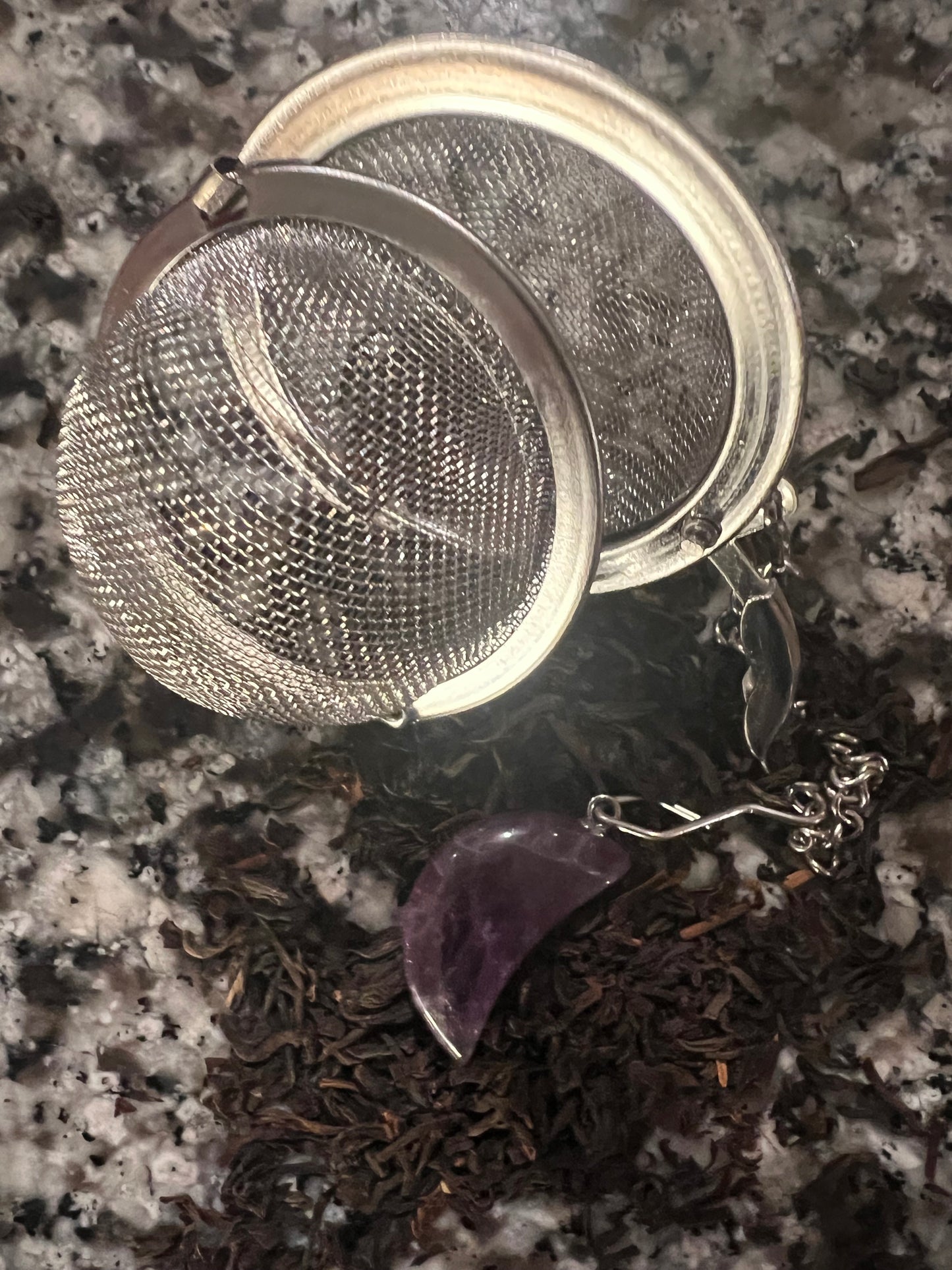 Tea infuser with half moon crystal charm